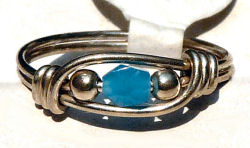 Sterling Silver Wire Wrapped Ring with Blue Facet Cut Bead